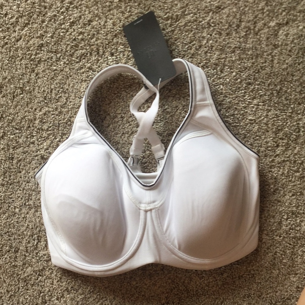 SYROKAN white sports bra.
